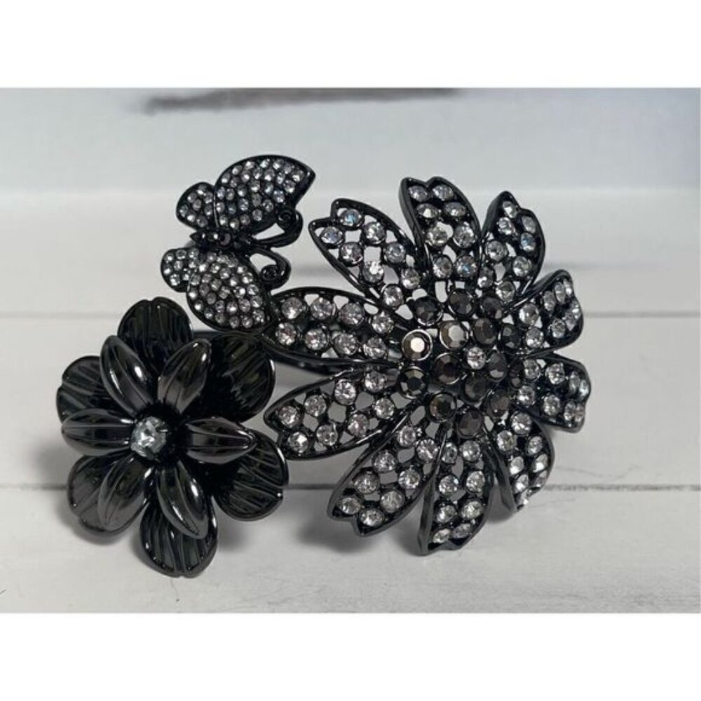 Black metal rhinestone/flower statement bracelet